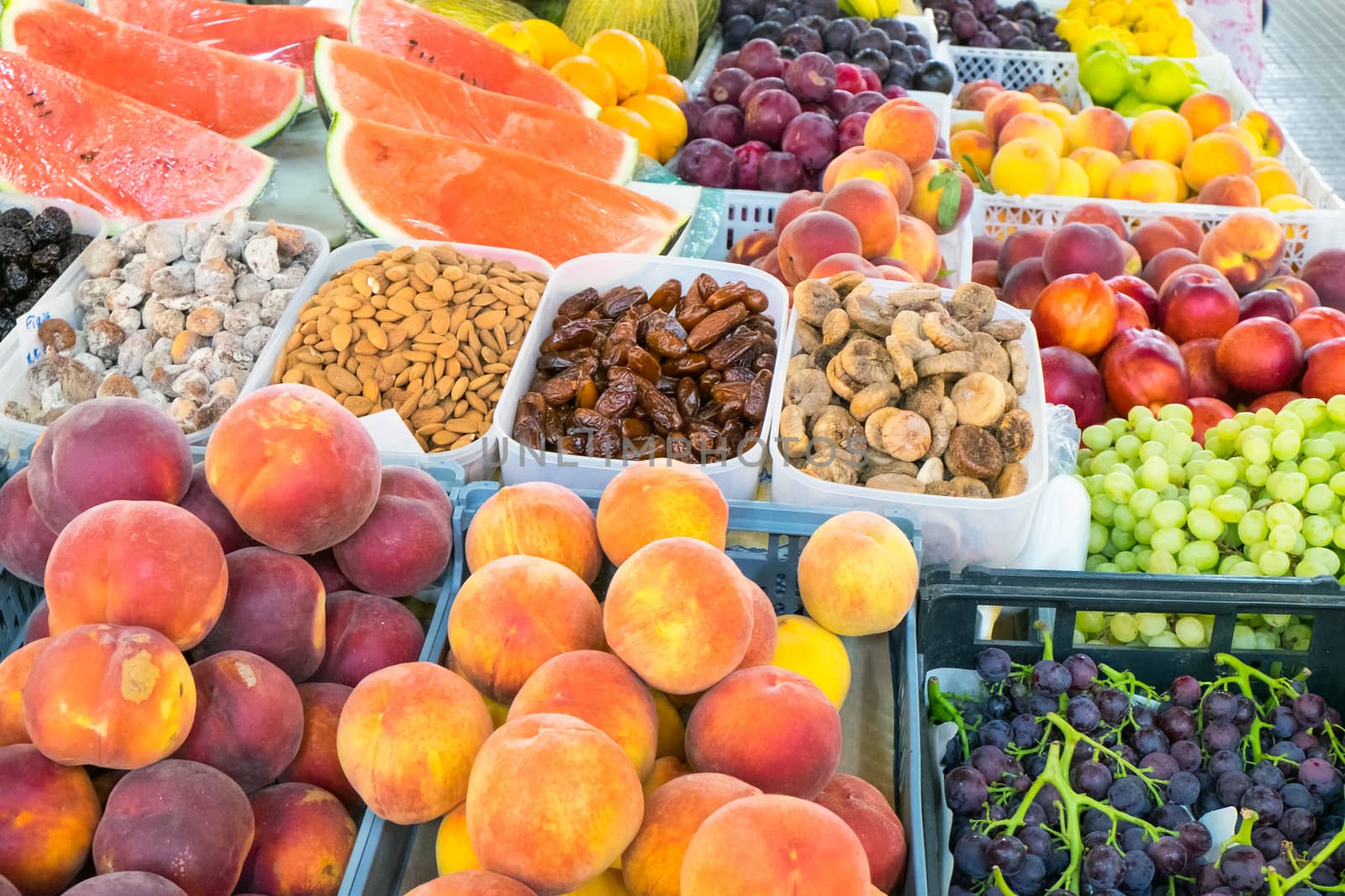 Plenty of fruit at a market by elxeneize