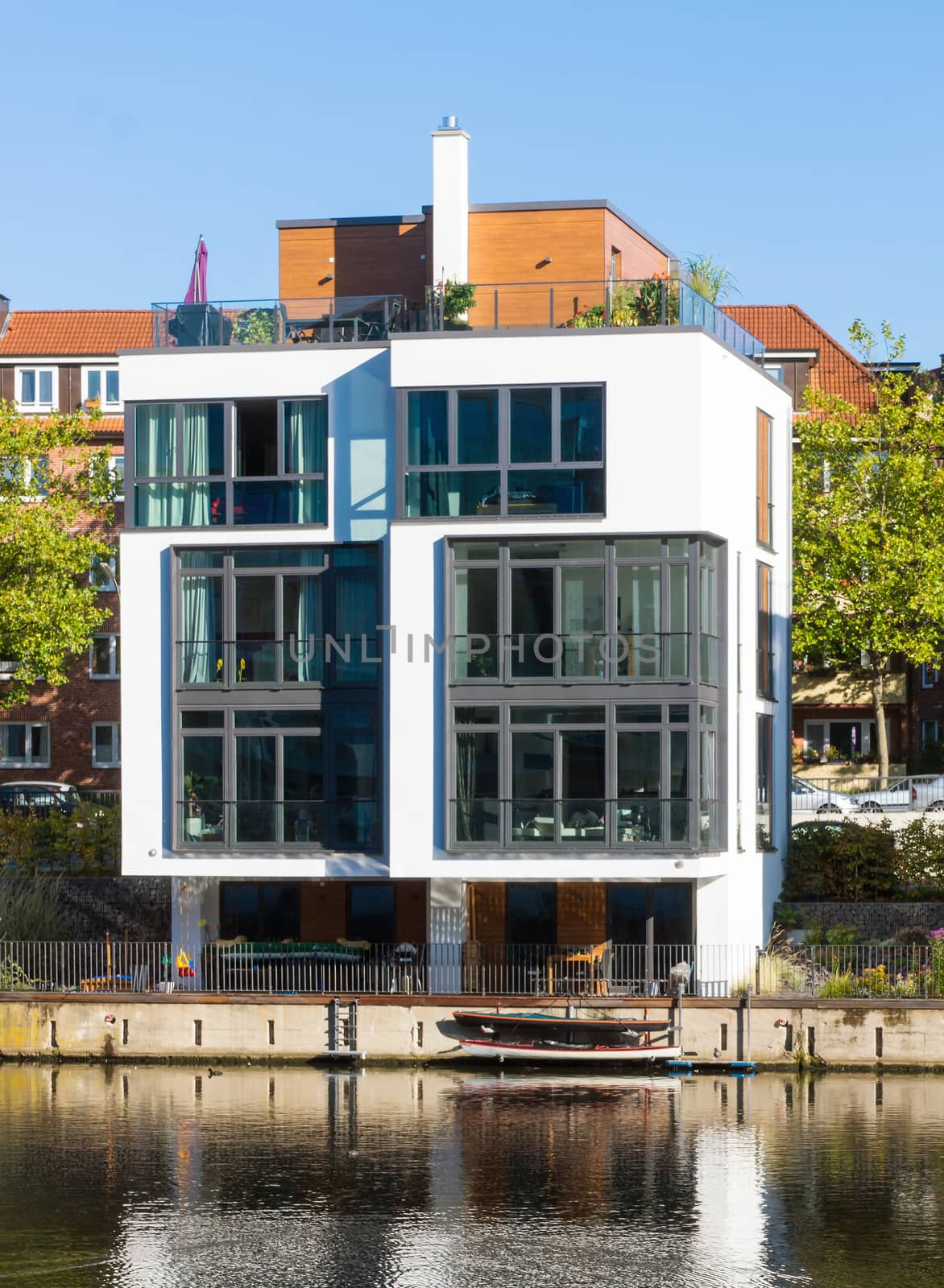 Townhouse at the waterside seen in Hamburg, Germany