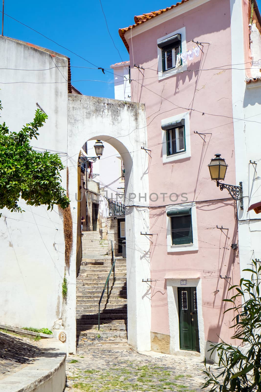 Street scene inside the old Alfama quarter in Lisbon, Portugal