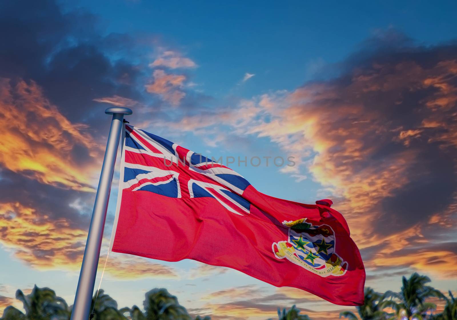The Cayman Islands Flag flying against Blue Sky