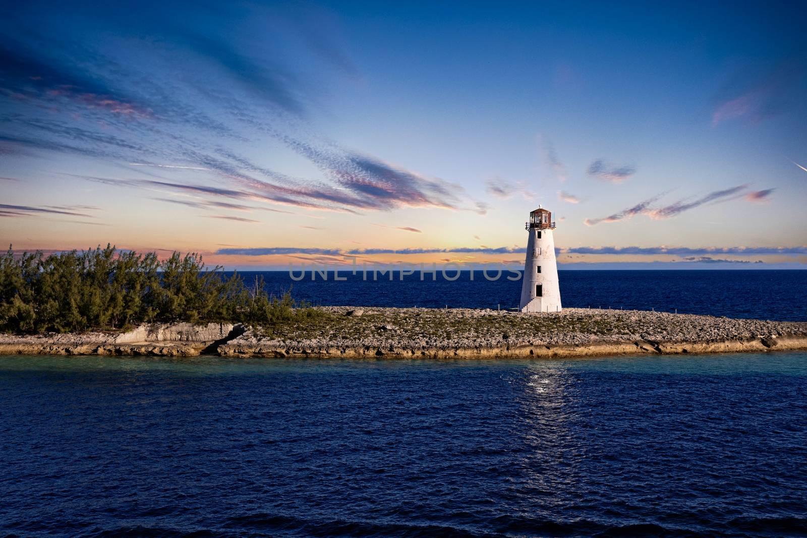Lighthouse at End of Point at Dusk by dbvirago
