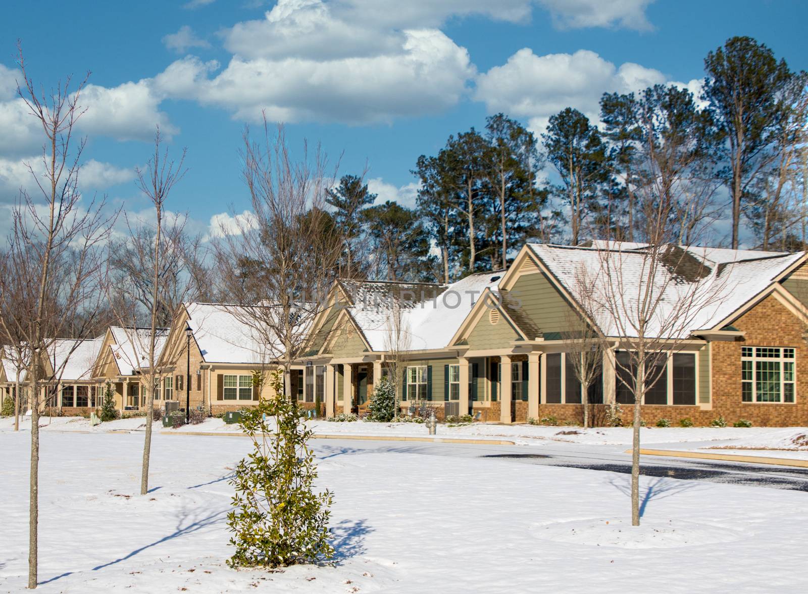 Nice Modern Townhouses on a Winter Day under blue Skies