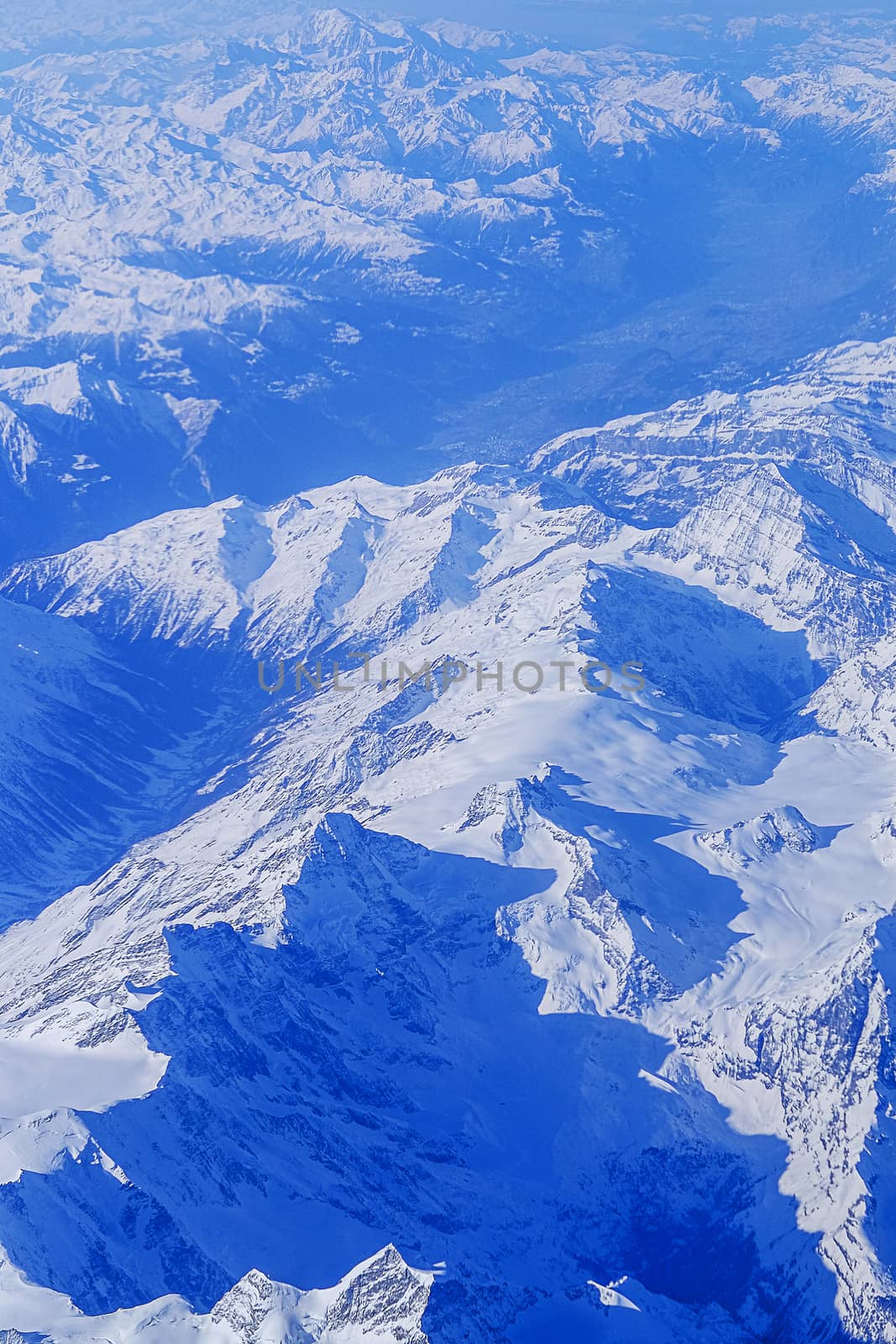 High mountains covered with snow

 by Surasak