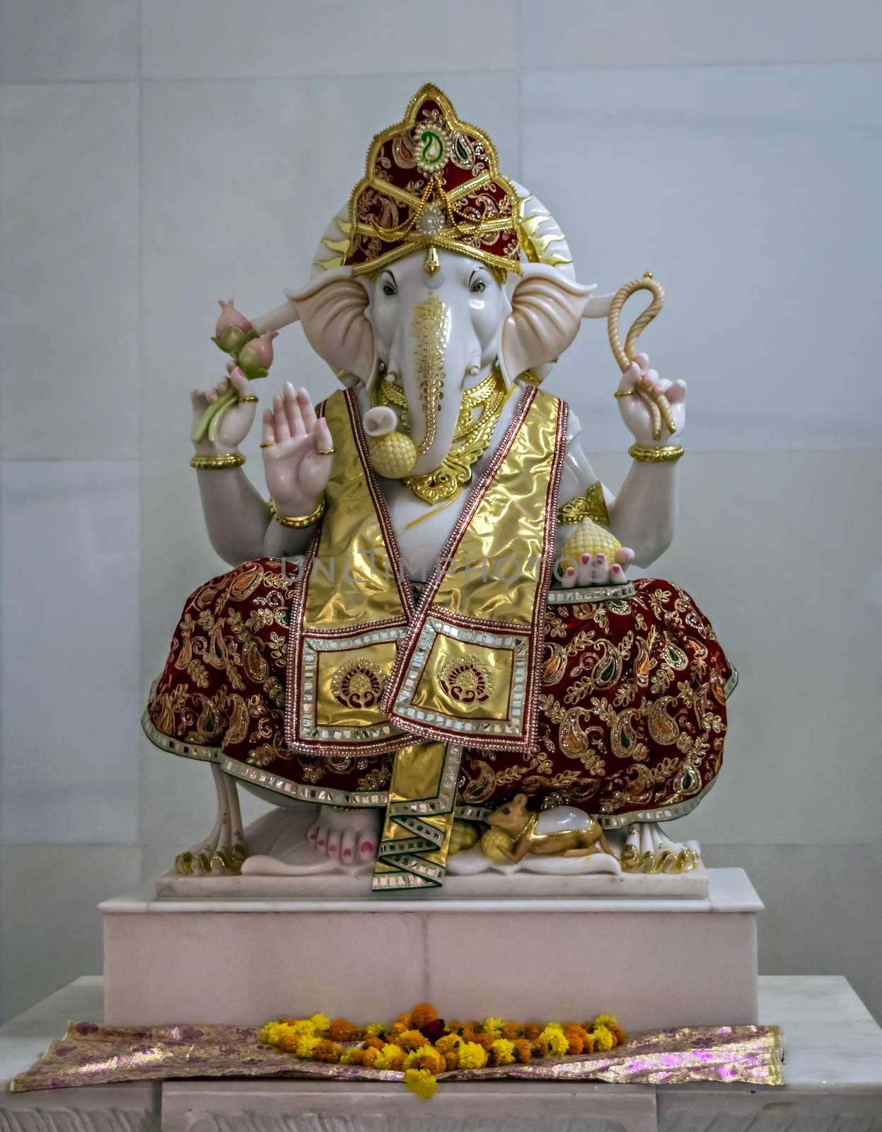 Nicely carved and decorated isolated idol of Hindu God Ganesha in a temple at Somnath, Gujrat, India. by lalam