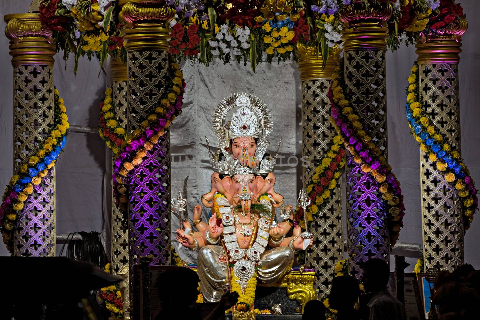 Closeup , landscape view of decorated and garlanded Isolated idol Panchmukhi Ganesha in Pune ,Maharashtra, India.