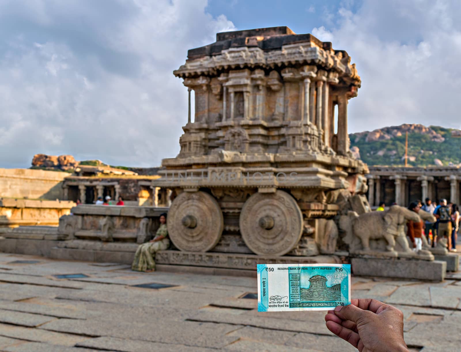 Image of Rs.50 Indian currency note that features richly sculpted ancient stone chariot at Viththla temple in Hampi, Karnataka. It is considered to be the most stunning architecture of the Vijayanagara kingdom.