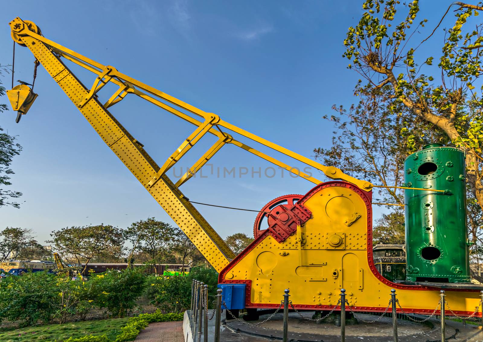 Old, Ancient steam operated crane displayed as showpiece in heritage museum of Indian Railways in Mumbai CST.