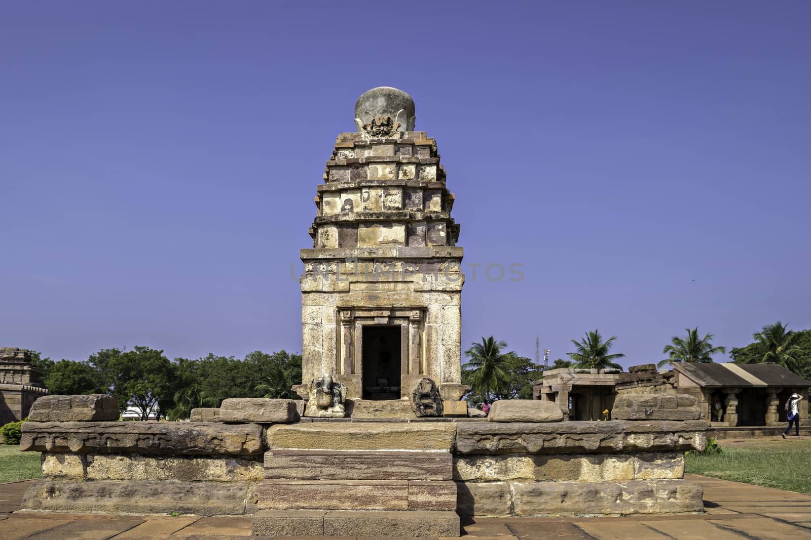 Ancient natural stone temple with clear blue sky background  in Aihole, Karnataka, India.
