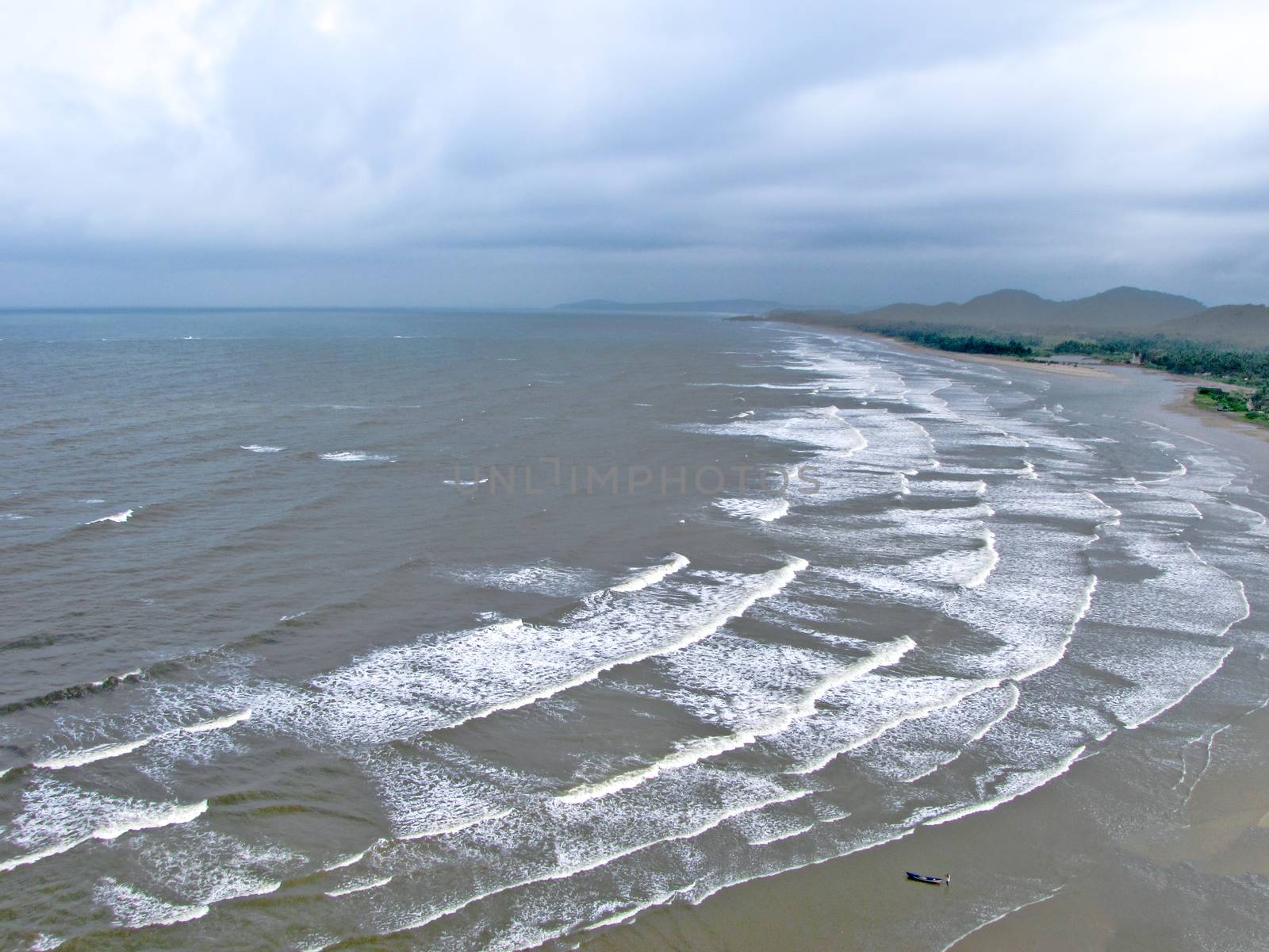 Arial view of waves pattern and sea at Murudeshwar, Karnataka, India.