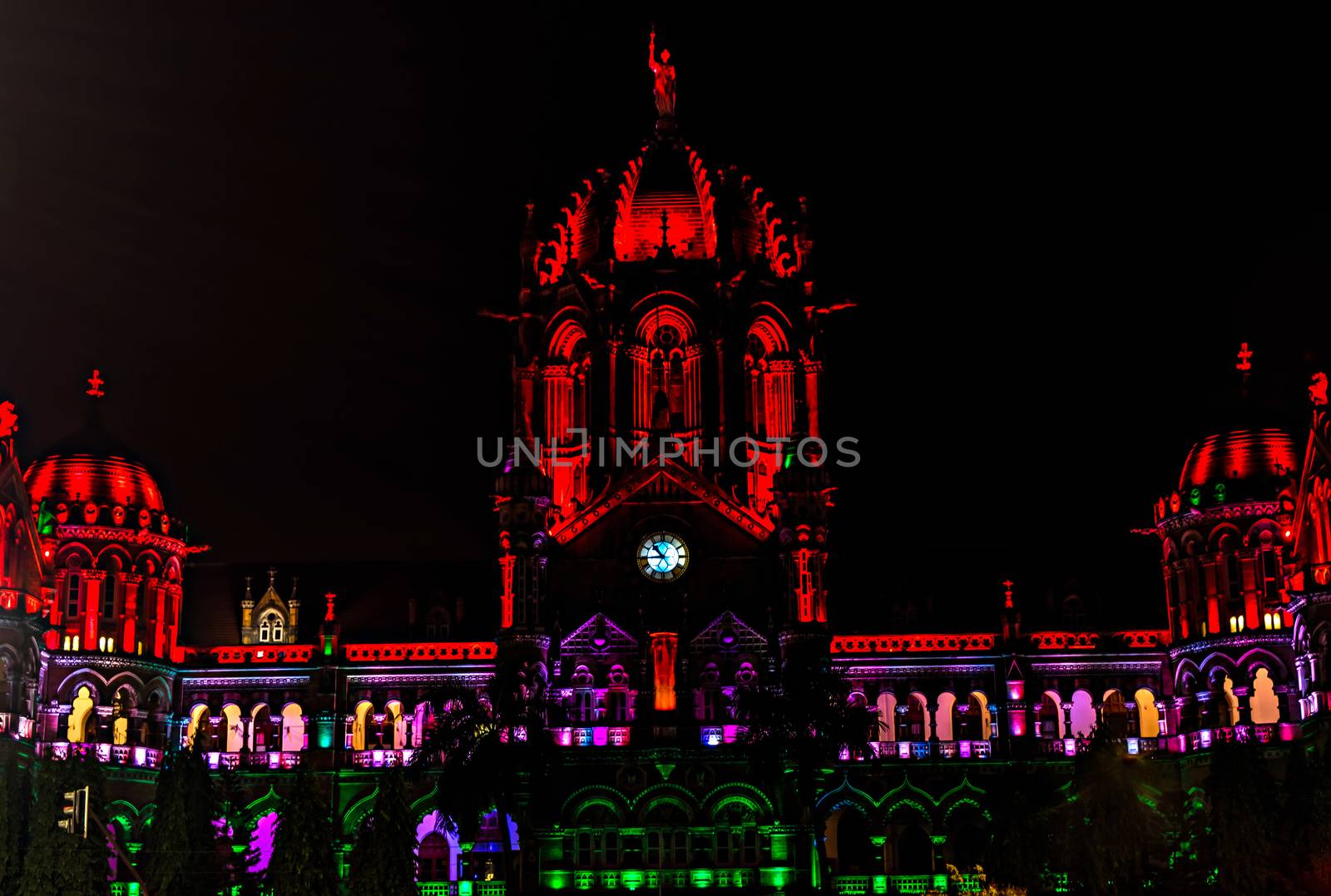 UNESCO world heritage building of `Chatrapati Shivaji Maharaj Terminus` railway station illuminated resembling like Indian flag by lalam