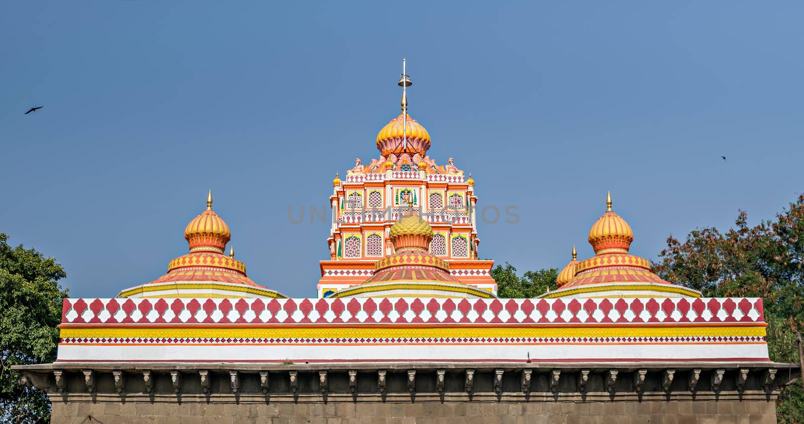 Nicely carved and painted dome of the Omkareshwar temple of Pune. by lalam
