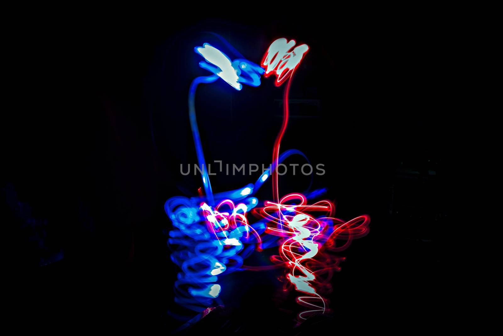 Photograph of abstract light Painting art indicating love. by lalam