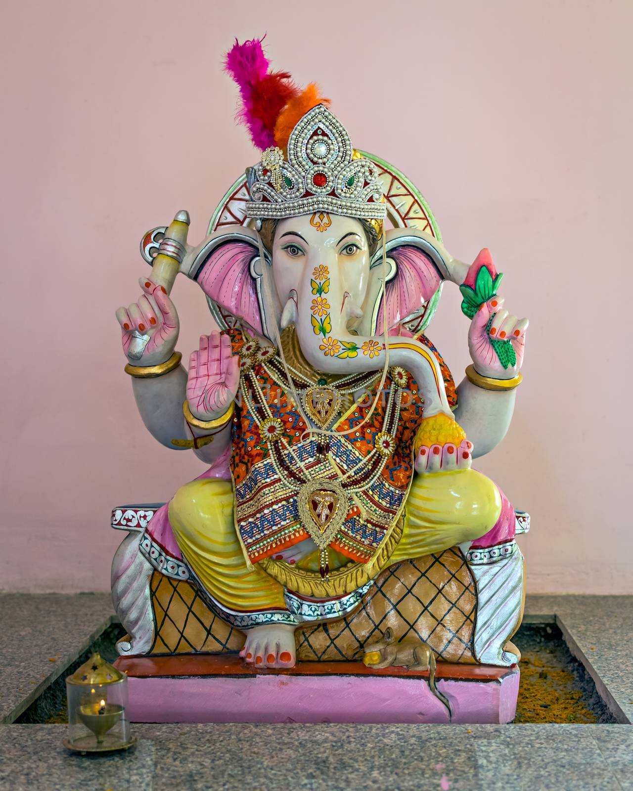 Isolated idol of Hindu God Ganesha in a temple at Yavatmal, Maharashtra, India. by lalam
