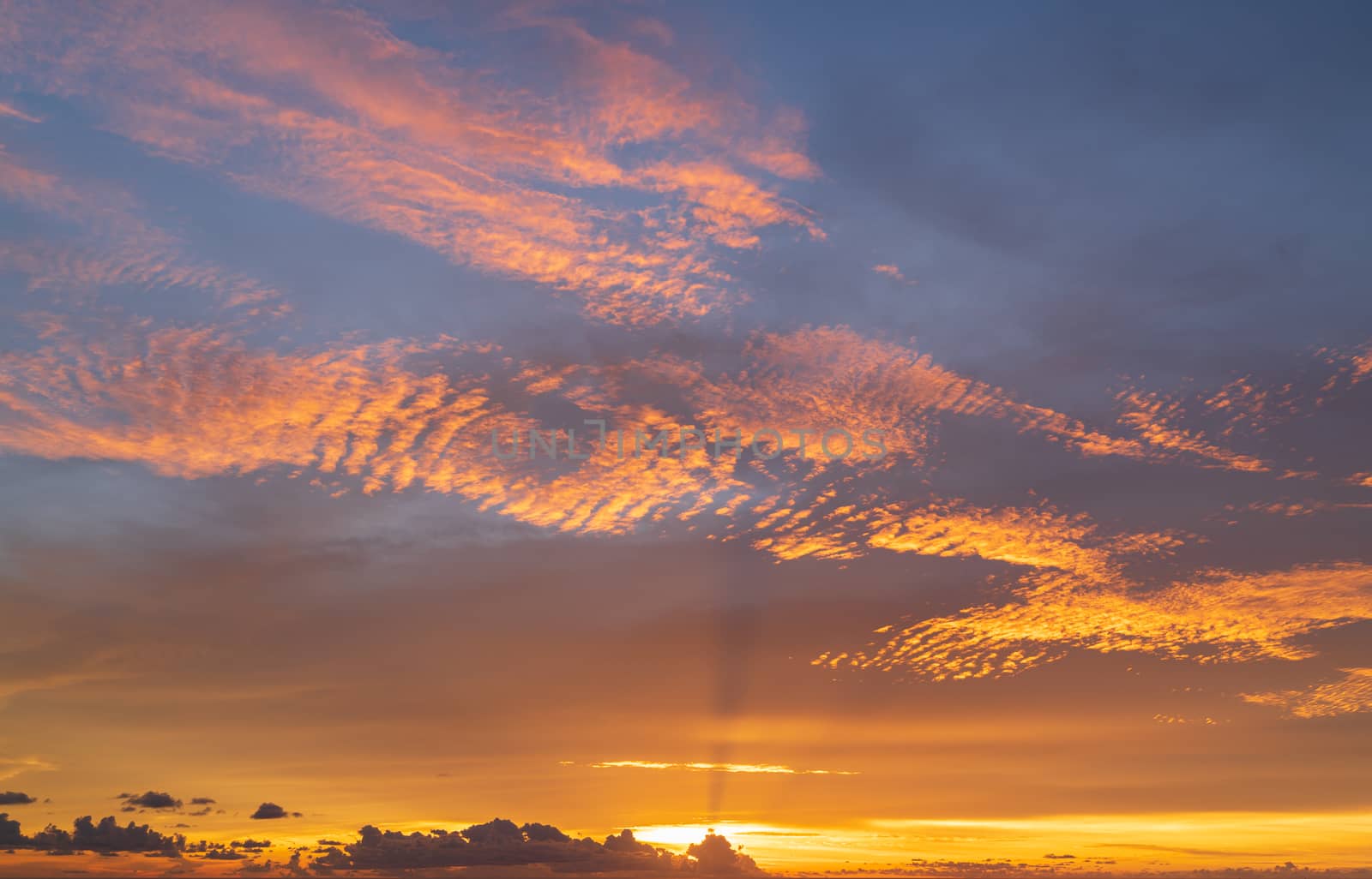 Abstract amazing Scene of stuning Colorful sunset with clouds background in nature and travel concept, wide angle shot Panorama shot 