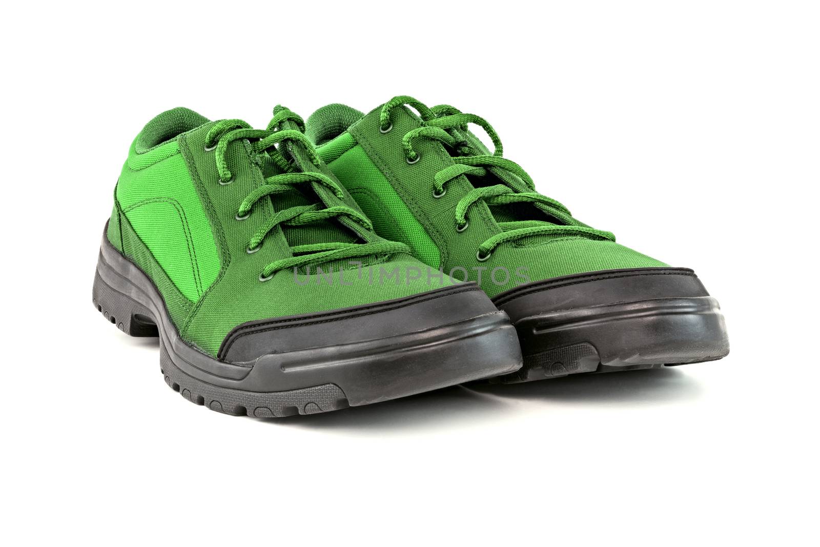 two simple green hiking or hunting shoe isolated on white background.