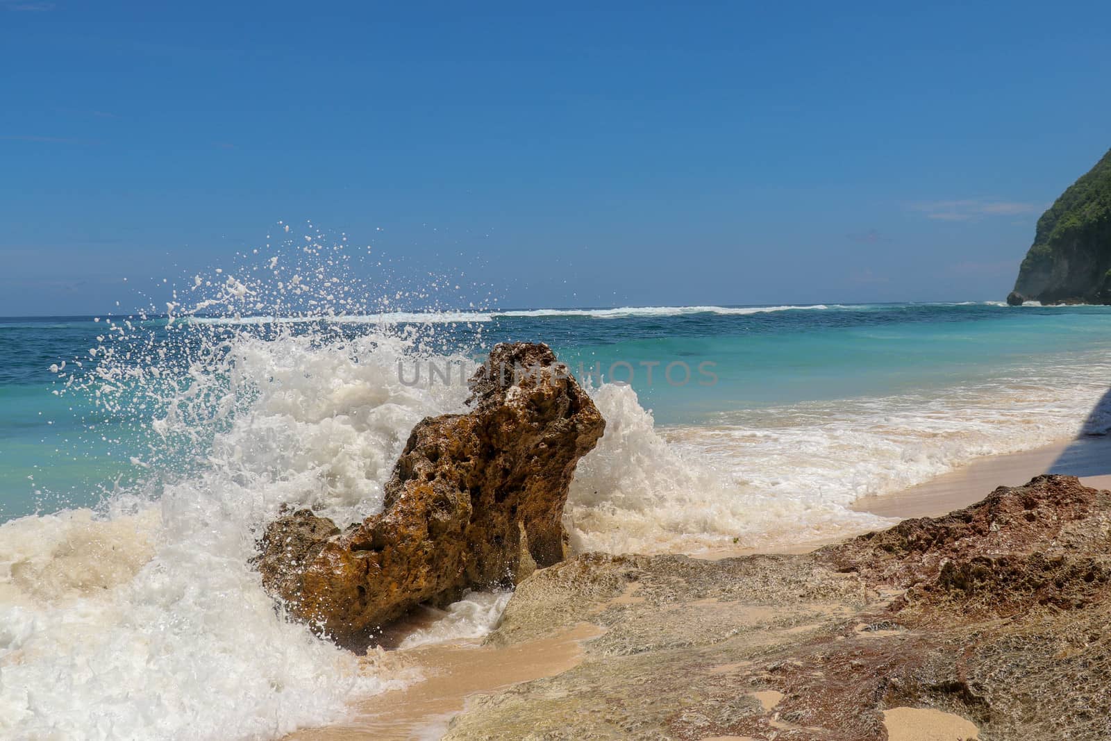 Splashing waves on shore. Waves splashing sea beach