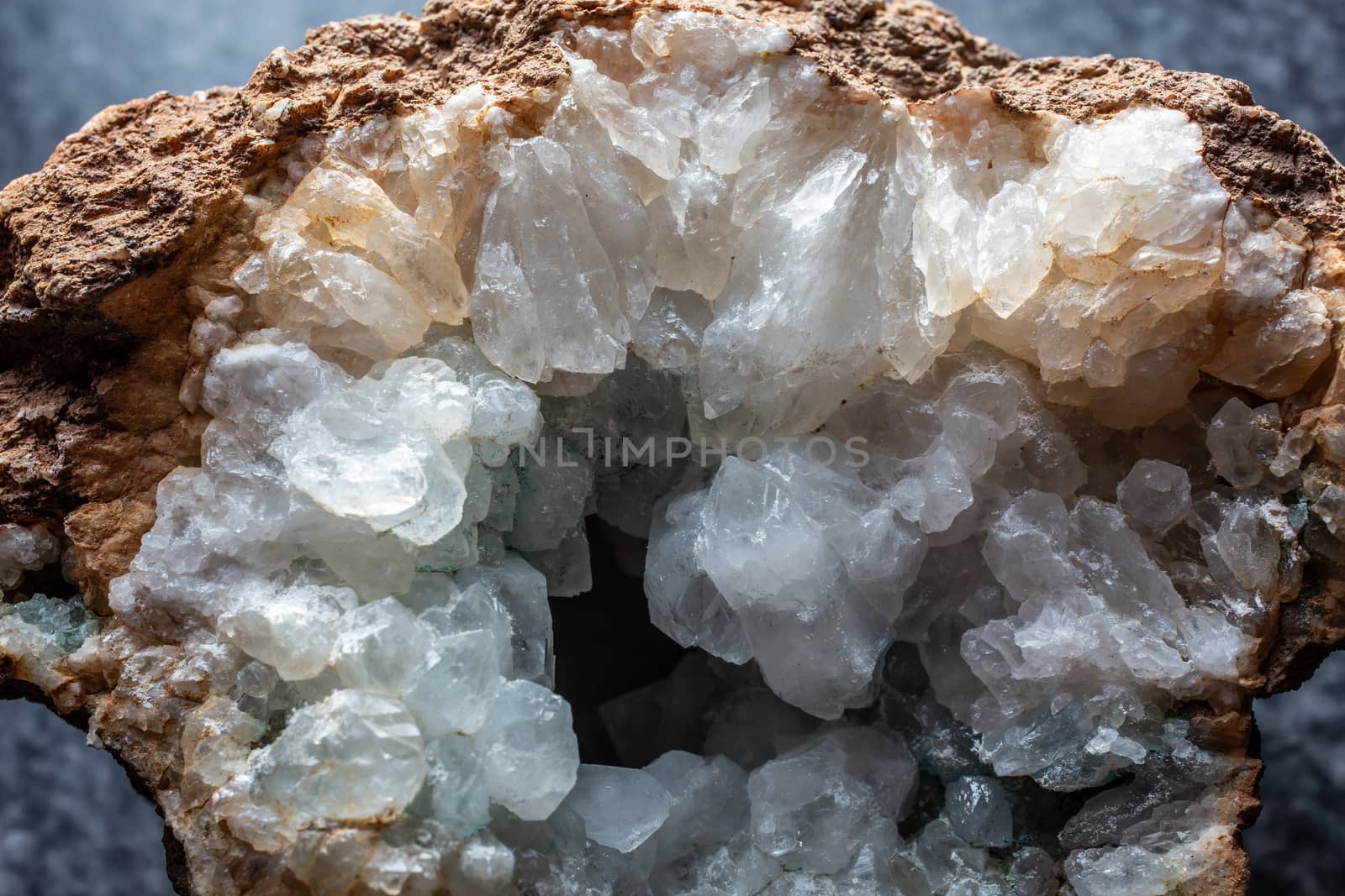 transparent shiny rock crystals in a geode by Dr-Lange