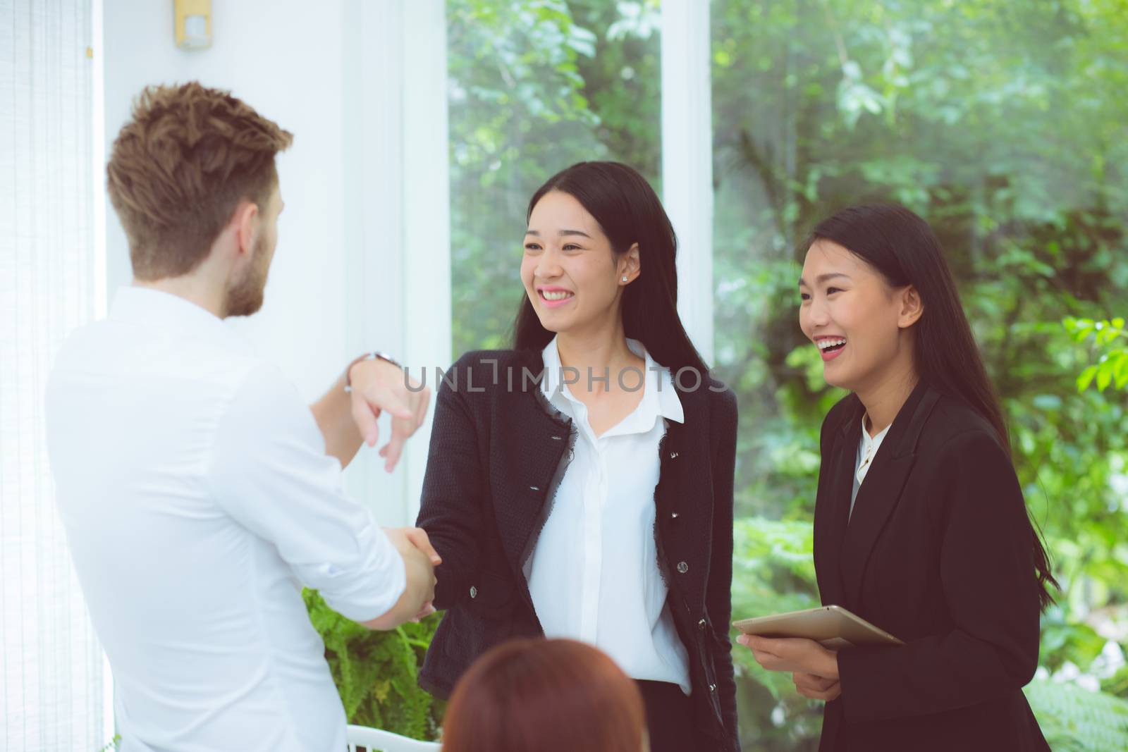 business people colleagues handshake with success during meeting.