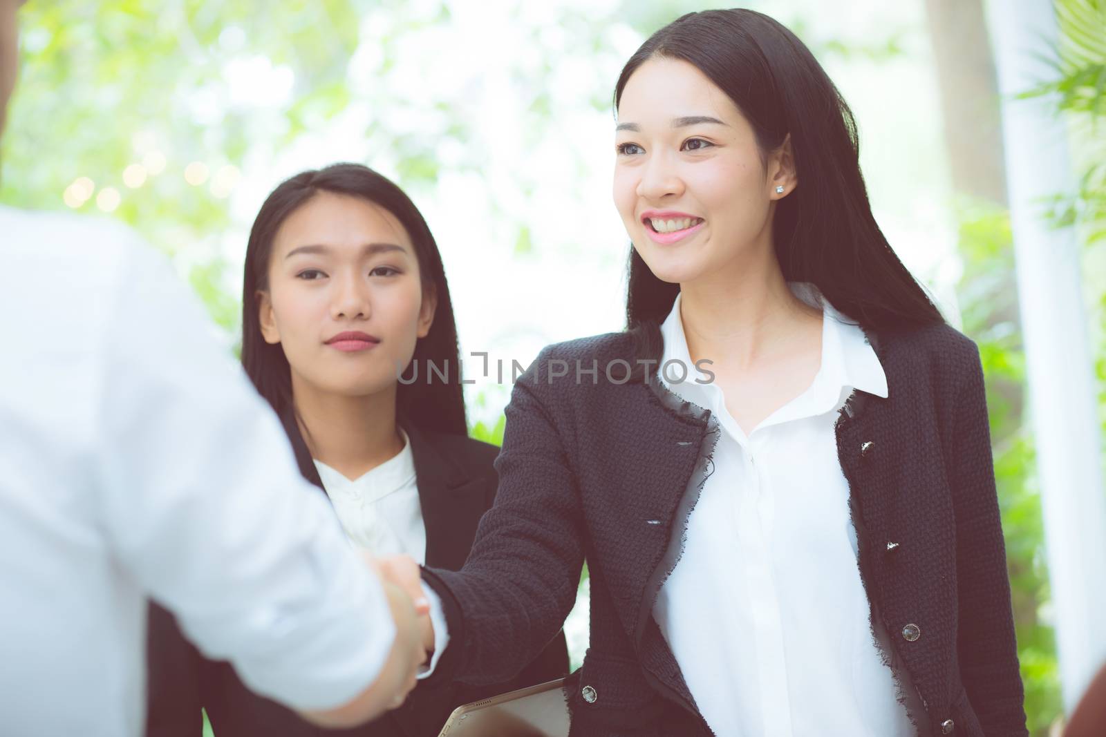 business people colleagues handshake with success during meeting.