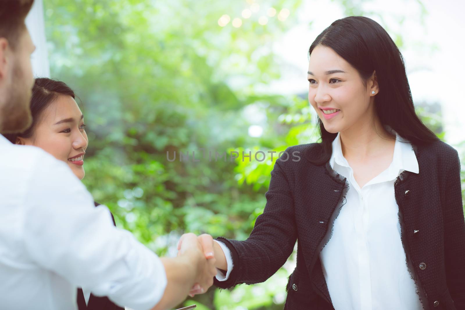 business people colleagues handshake with success during meeting.