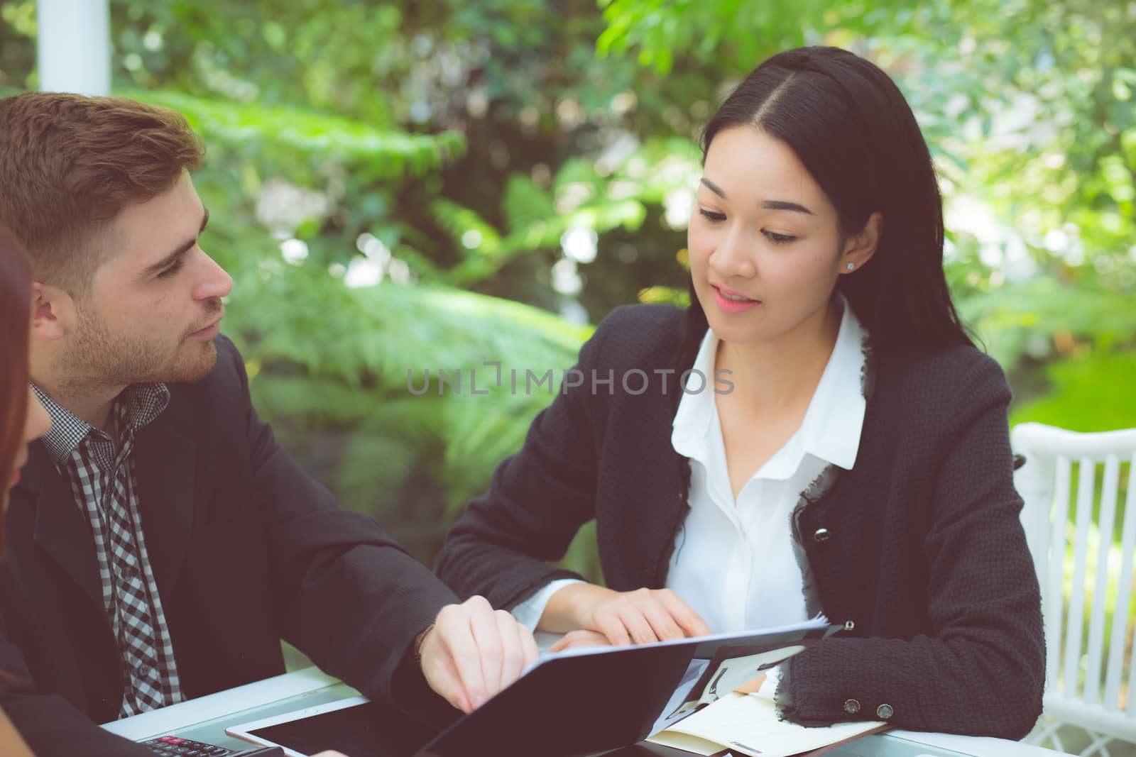 young business people making meeting and talking for analyzing marketing working at office on desk.