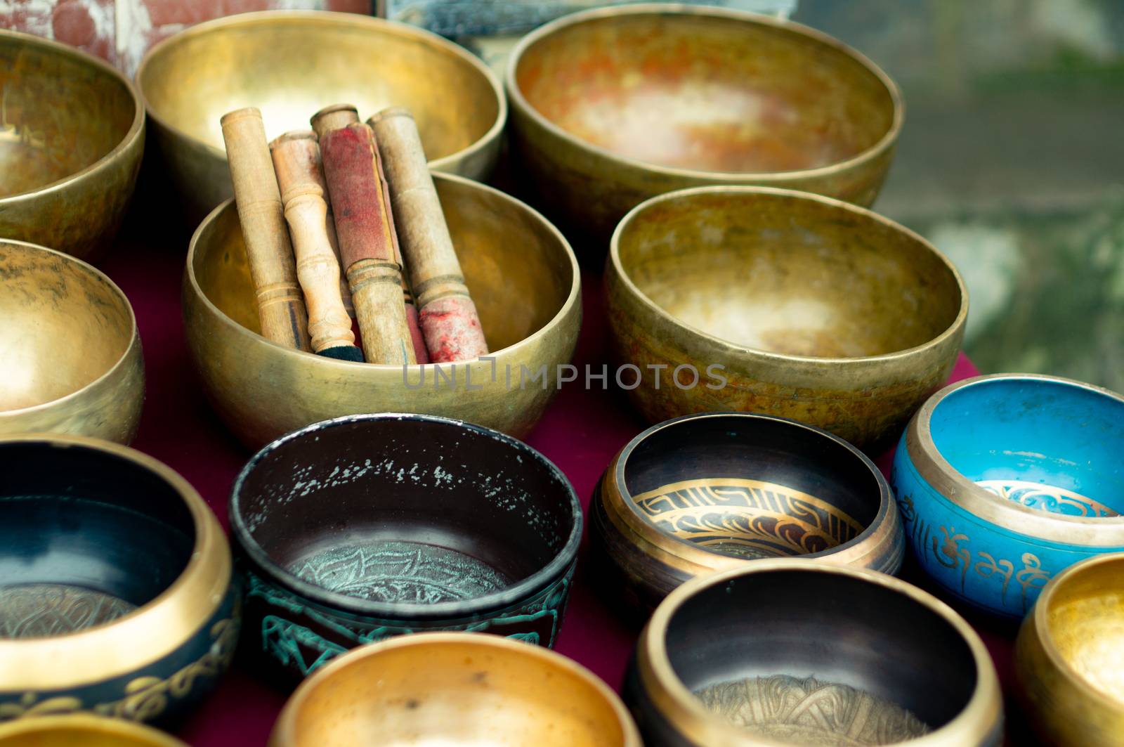 Brass singing musical bowls placed in a shop in mcleodganj himachal pradesh. Tibetan singing bowls are a popular souvenir helps in relaxation and fun