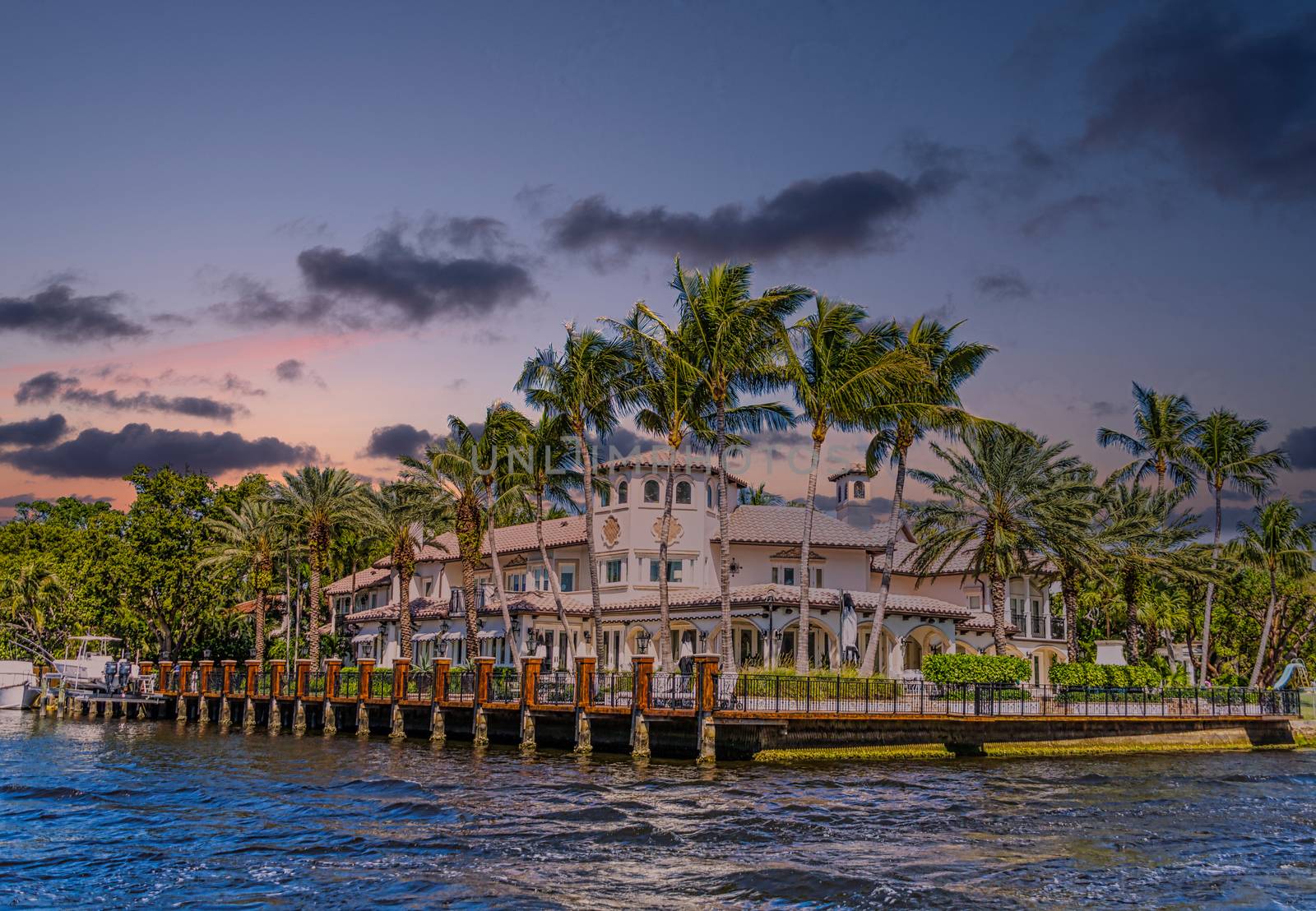 White Mansion and Palm Trees at Sunset by dbvirago