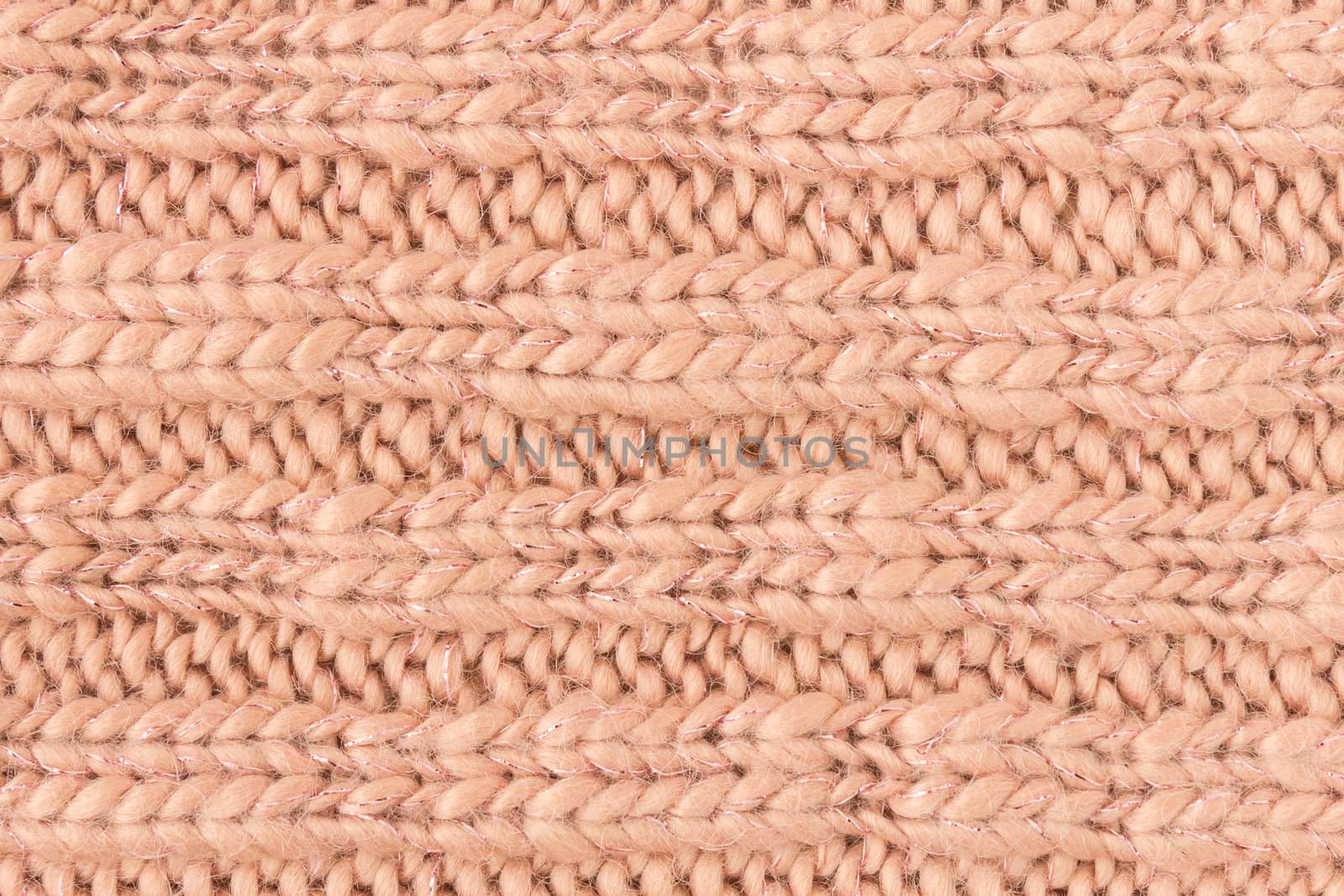 Brown Knitting Texture or Knitted Texture Background in macro style. Knitting Texture or Knitted Texture in vintage style for design