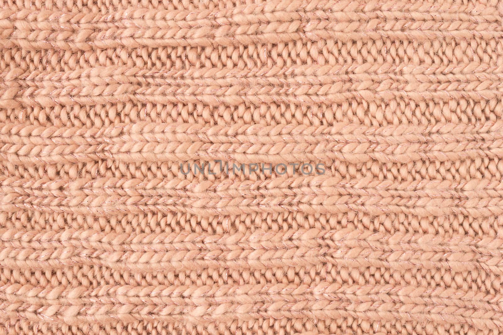 Brown Knitting Texture or Knitted Texture Background in macro style. Knitting Texture or Knitted Texture in vintage style for design