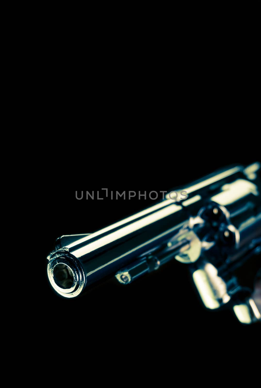 Vintage Stainless Gun or Shooter on Black Background Book Cover Portrait Style. Fake stainless gun or shooter in portrait view for criminal or violence concept