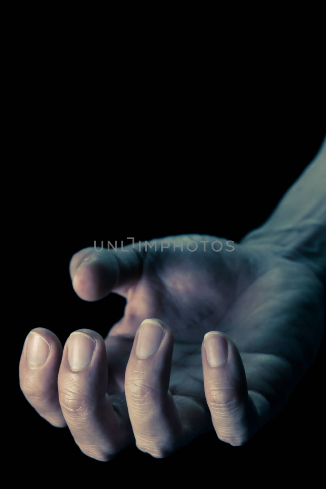 Vintage Upturned Human Hand for Devil Crime Violence Concept in Book Cover Style. Upturned Human Hand Portrait View for Devil Crime Violence Concept