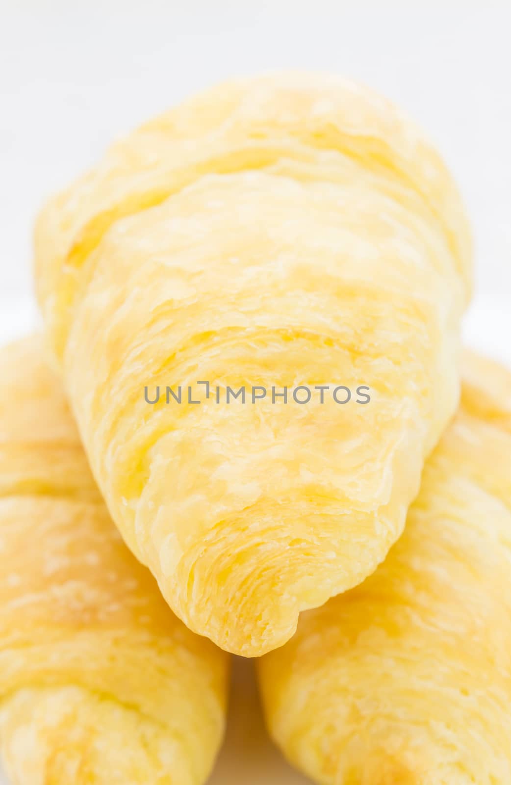 Croissant or Bread or bakery on white dish close up view