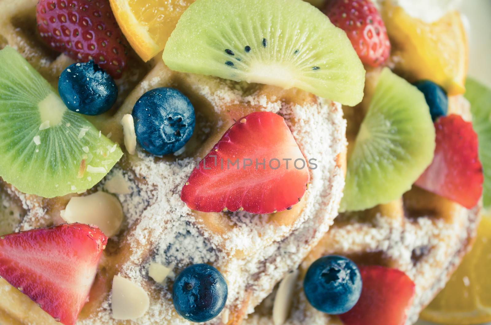 Vintage Flatlay Strawberry Blueberry Kiwi Lemon Waffle Dessert by steafpong