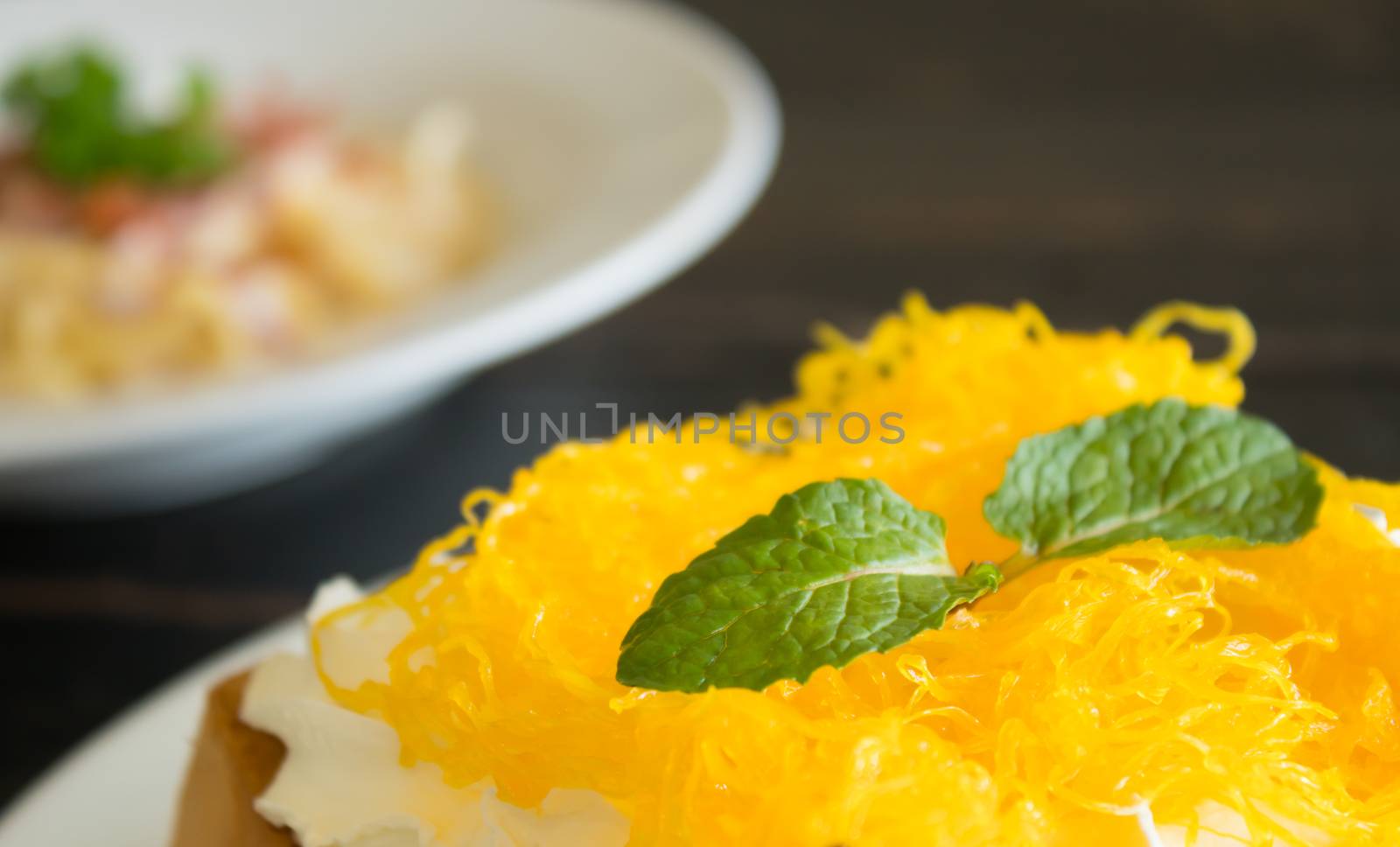 Golden Egg Yolk Threads or Foi Thong Thai Dessert Whipped Cream  by steafpong