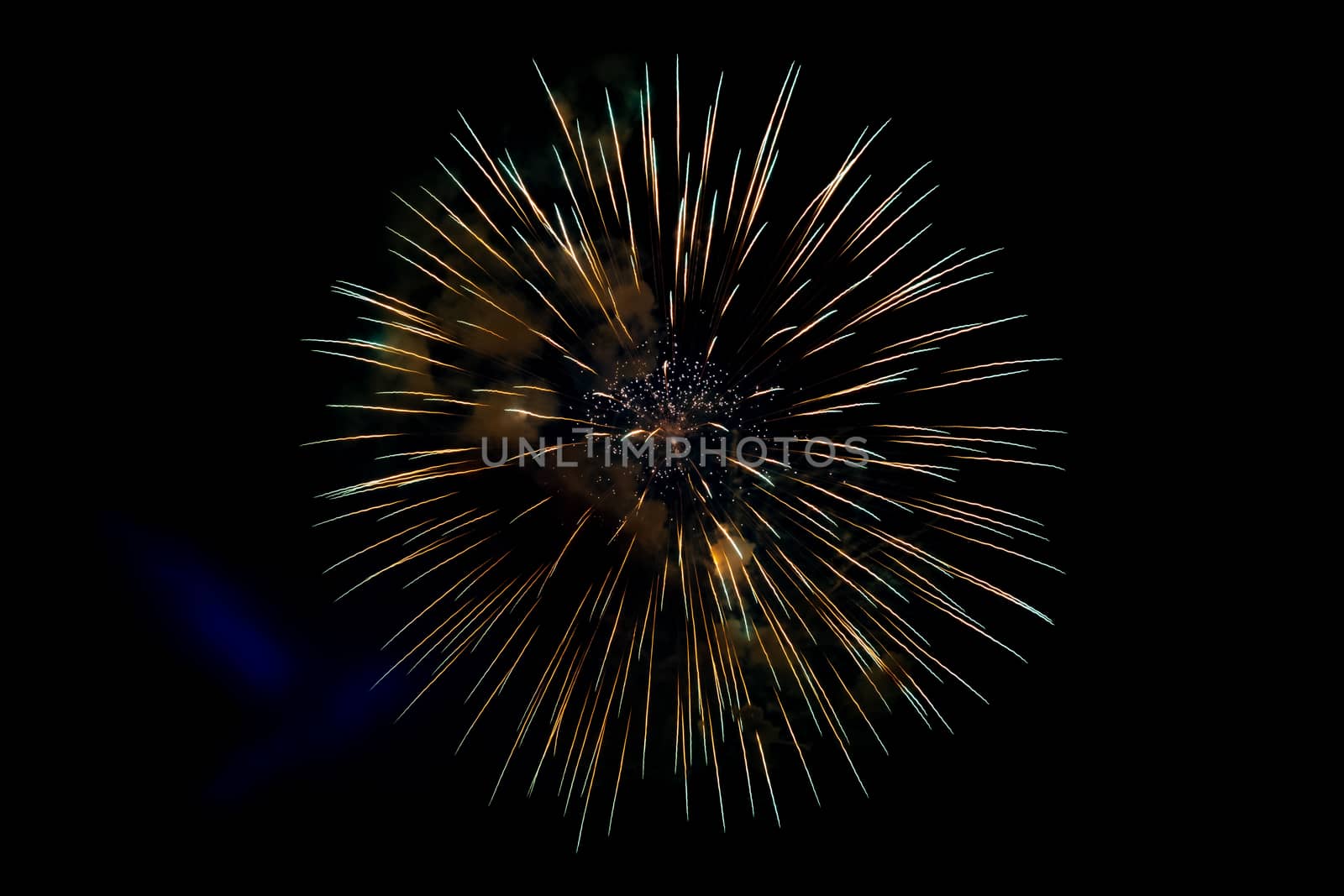 Center Yellow Sparkling Fireworks Background on Night Scene. Abstract color fireworks background and smoke on sky