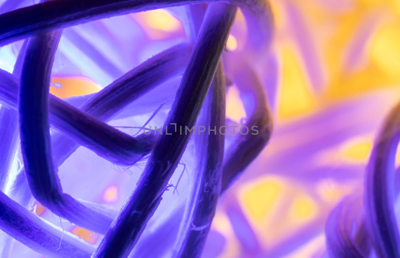 Abstract Purple Yellow Christmas Lights Rattan Ball Background in Close up View
