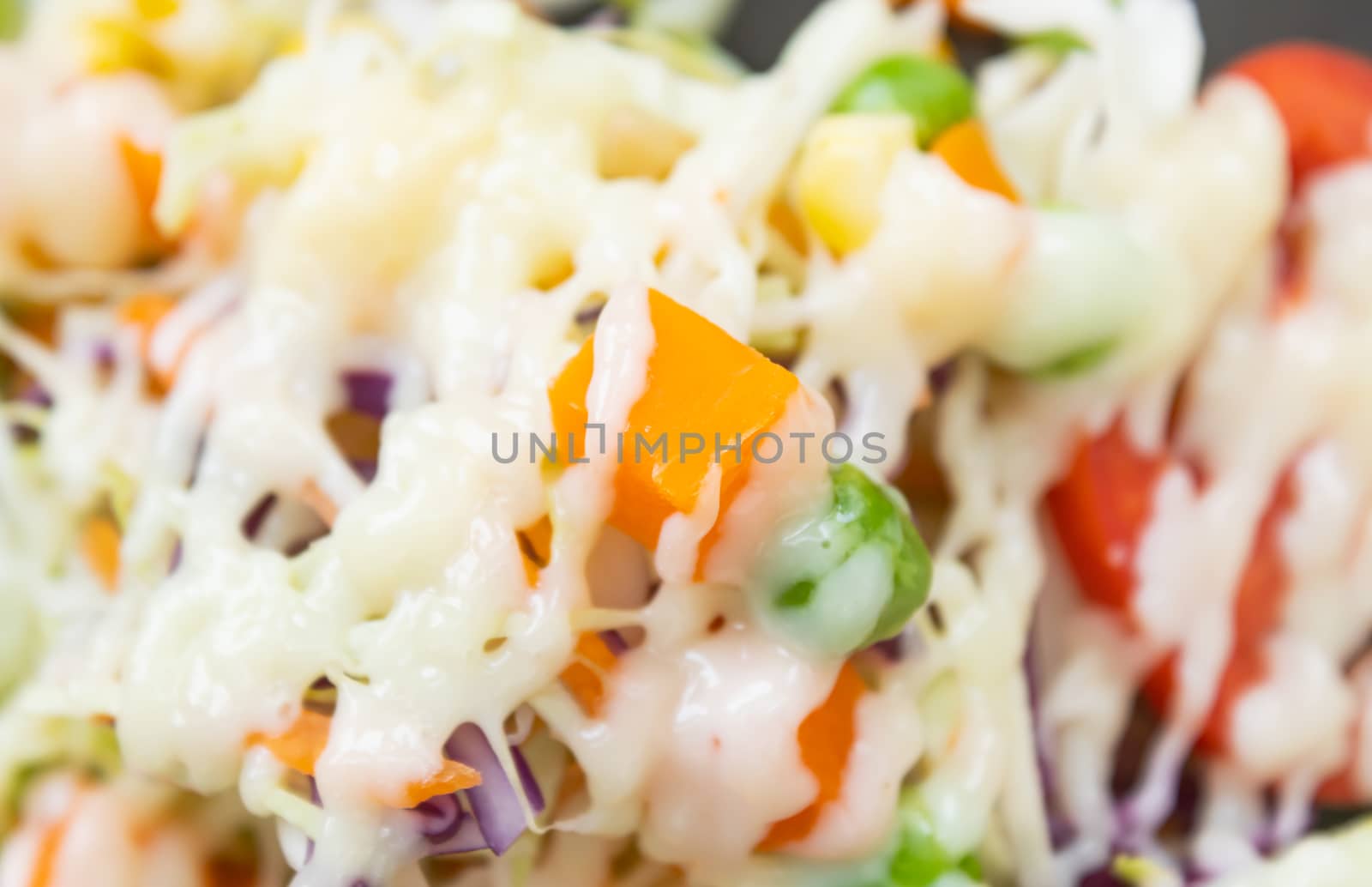 Healthy Salad include Carrot and Corn and Peas and Tomato and Cabbage with Mayonnaise Topping with Natural Light in Close Up View