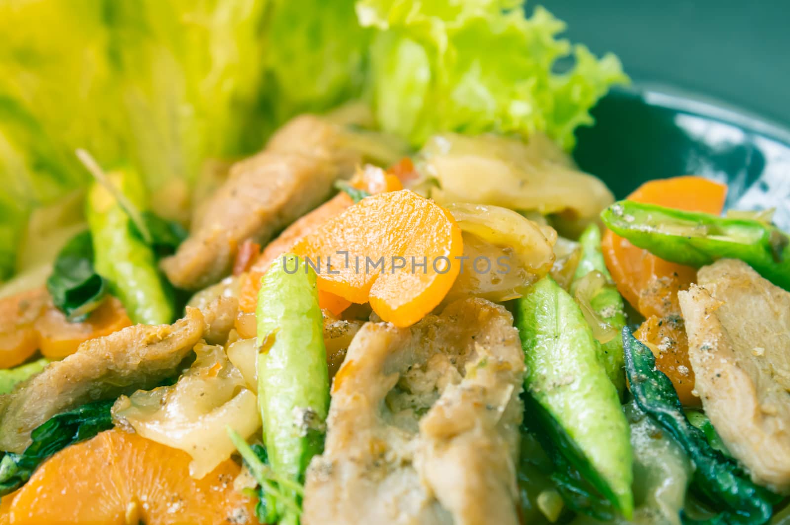 Stir Fried Noodle and Pork with Black Soy Sauce in Center Frame  by steafpong