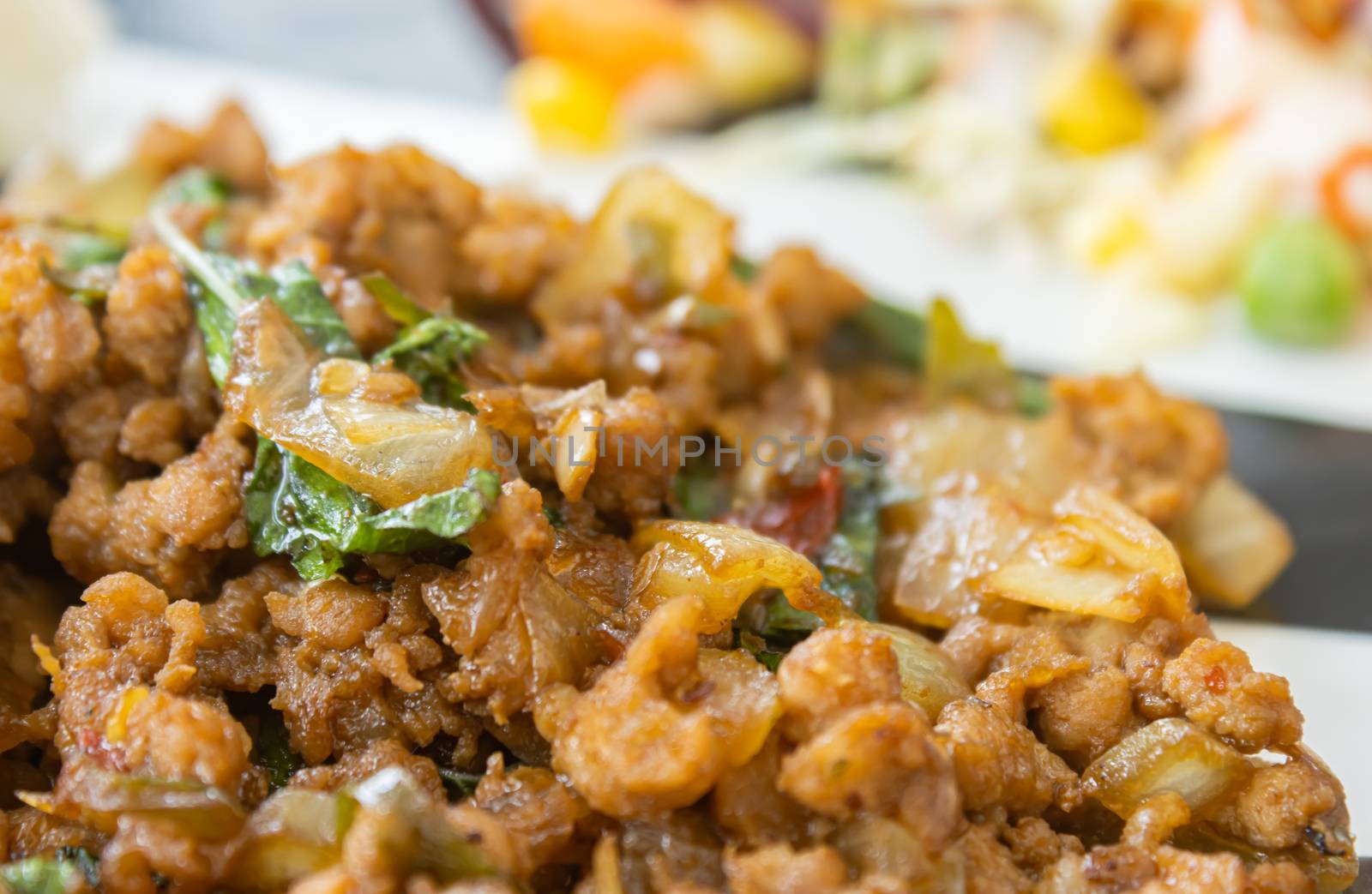 Stir-Fried Pork and Holy Basil and Chili on Left Frame. Delicious Thailand Food Menu for Health