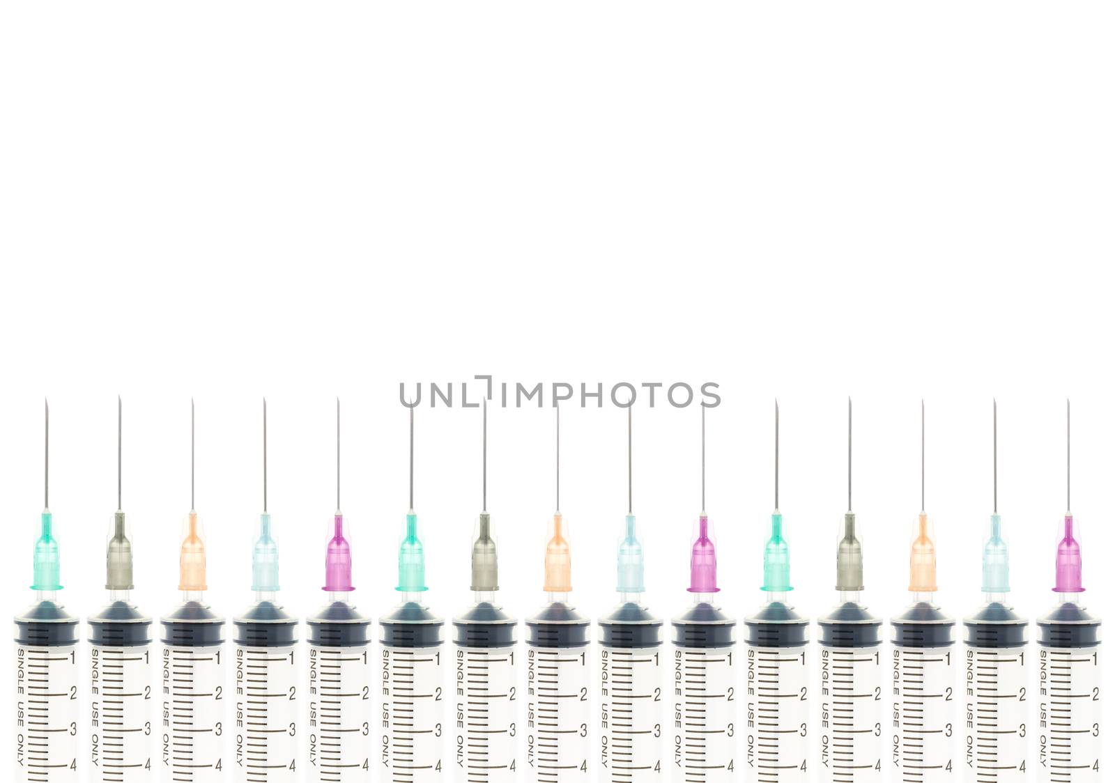 Five color needle or medical device isolated on white background at bottom horizontal view. Medical background for hospital or clinic or health design.