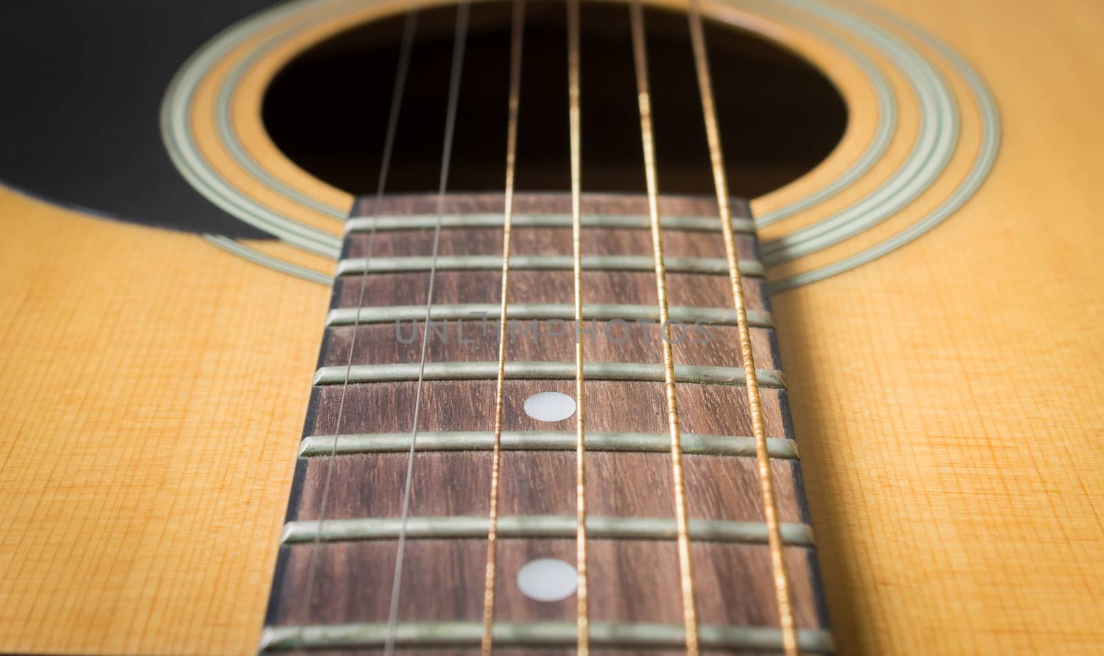 Fingerboard and Inlay and Old Acoustic Guitar String with Sound Hole and Pickguard