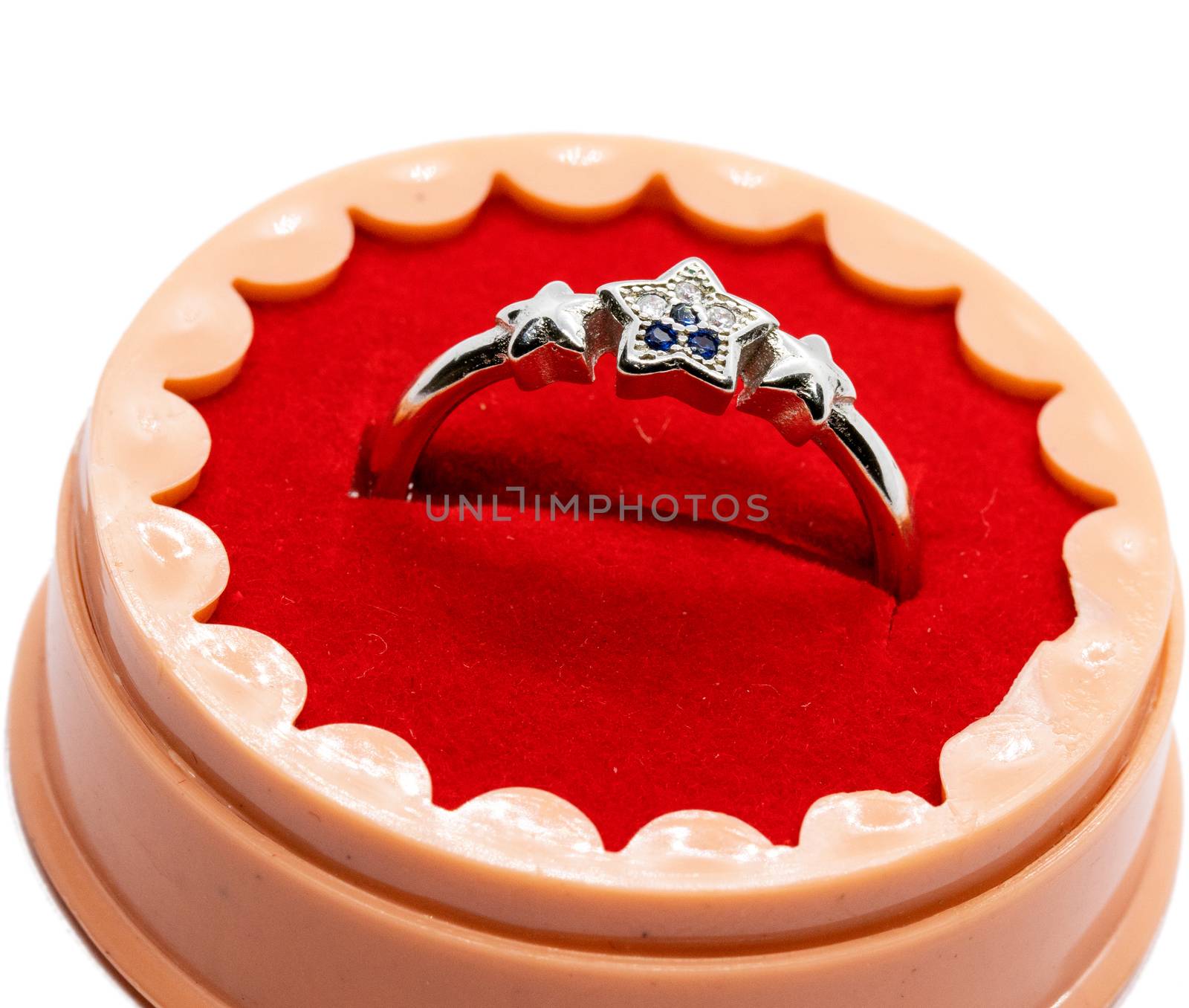 silver ring in the box for anniversary gift on white background