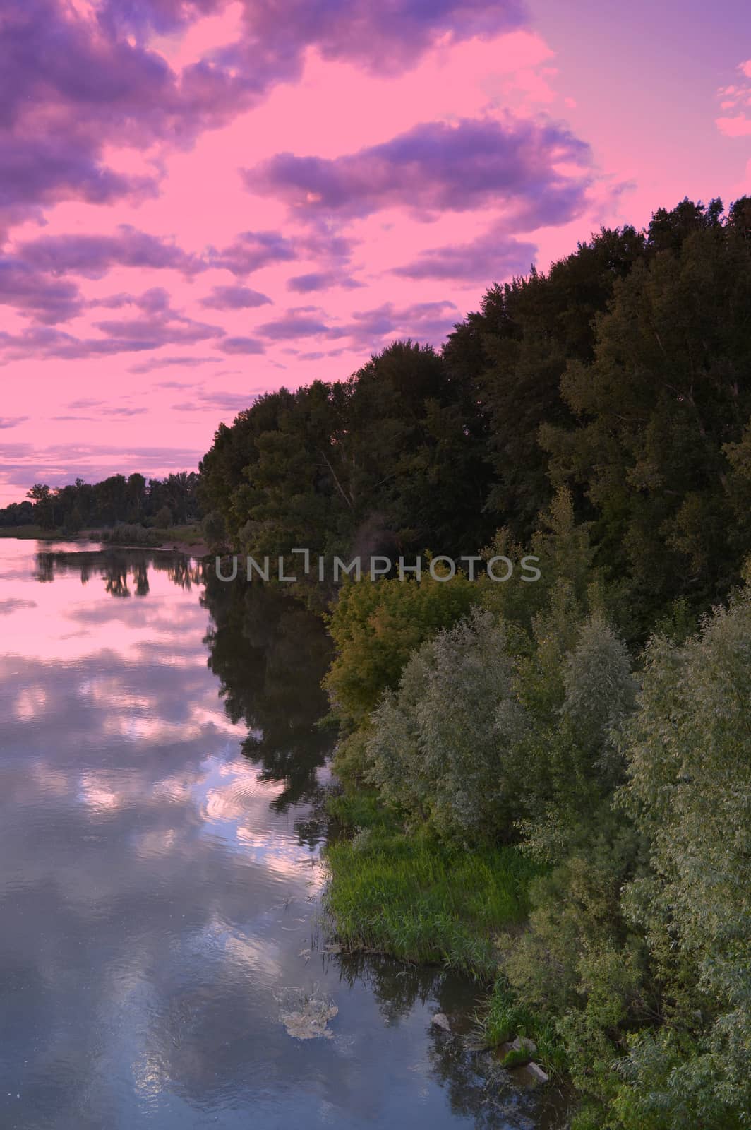 beautiful evening landscape with river and sunset