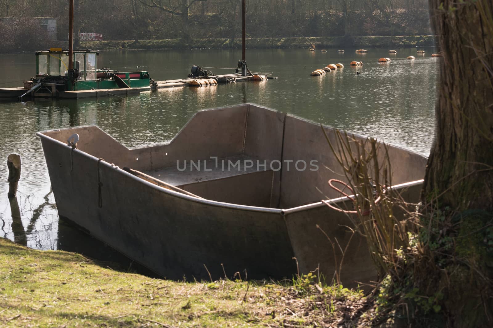 Dredger, Floating excavator when dredging of soil, sand and silt from a river.