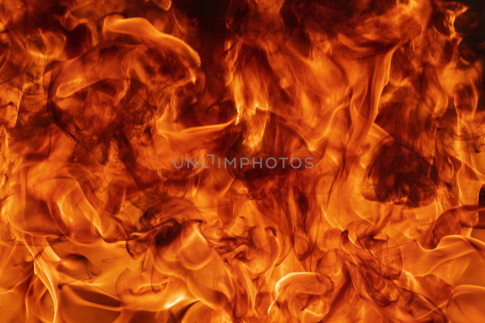 Flames red fire natural background. Beautiful dangerous firestor by Alexander-Piragis