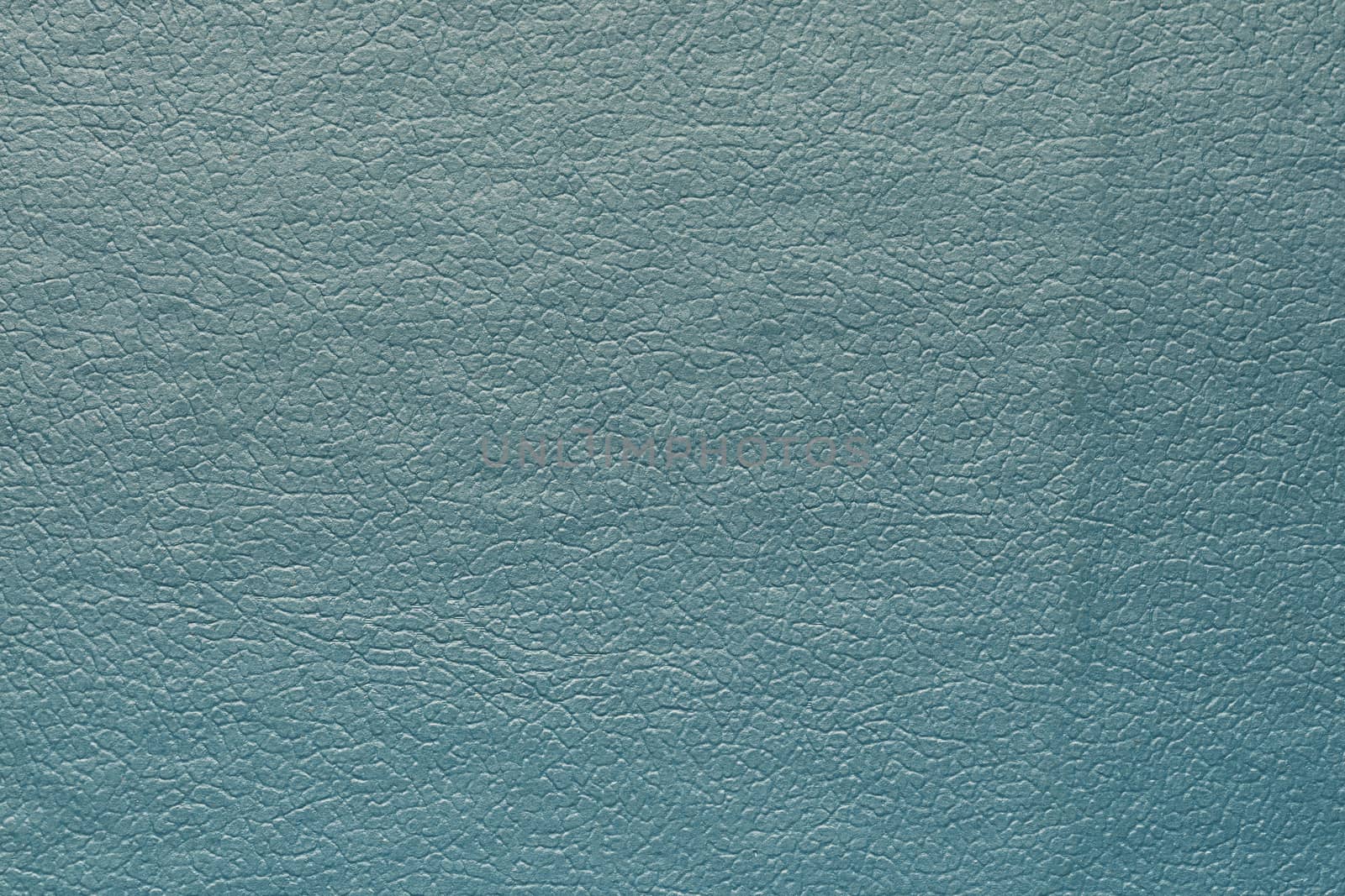 Synthetic blue leather for background. Close-up texture decoration material by Alexander-Piragis