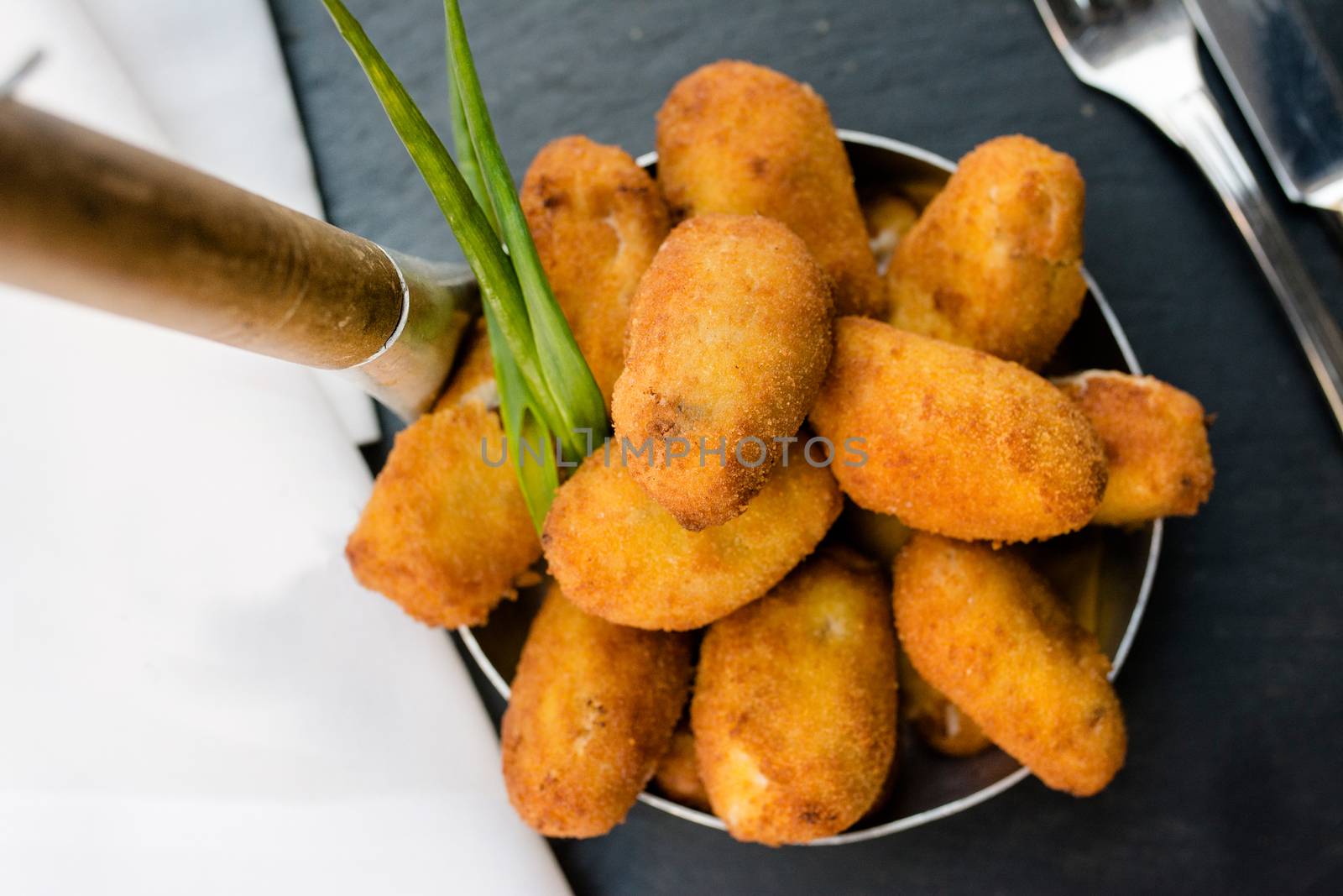 Spanish croquettes, breaded, and fried in olive oil.