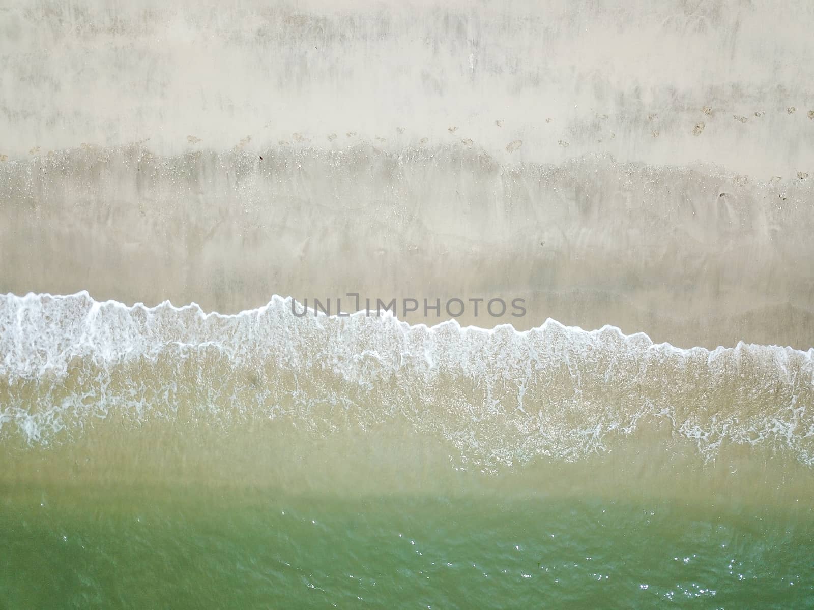 Blue ocean wave on clean sandy beach by silverwings