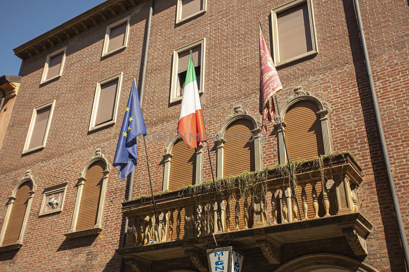Flag on institutional building by pippocarlot