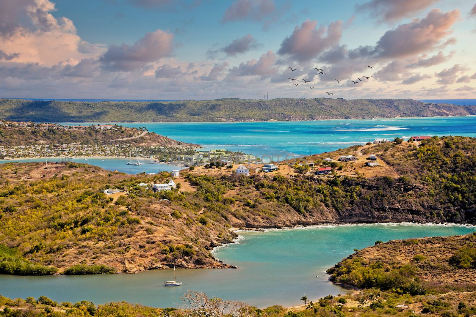 White Surf in blue Water Hitting Inlets and Coves on the Coast of Antigua